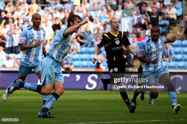 Elliott Ward of Coventry celebrates as he scores the first goal from the penalty spot during the Coca-Cola Championship match between Coventry City...