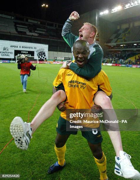 Celtic goalkeeper Rab Douglas with Dianbobo Balde celebrate on the pitch after their sides 1-0 victory over Boavista in their UEFA Cup semi-final 2nd...