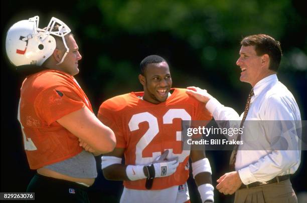 Miami coach Butch Davis with Duane Starks during practice. Miami, FL 8/10/1996 CREDIT: Bill Frakes