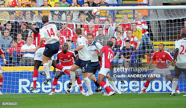 Bolton Wanderers' English forward Kevin Davies scores during the English Premier league football match on September 20, 2008 against Arsenal at the...
