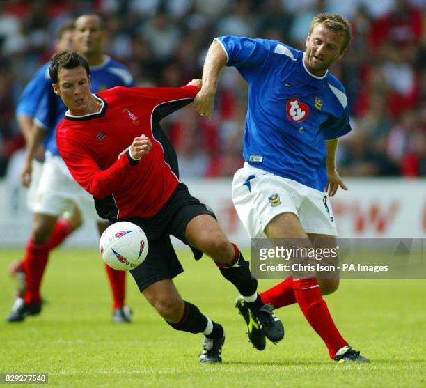 Marcus Browning of AFC Bournemouth in action against Tim Sherwood of Portsmouth during a pre-season friendly at Dean Court in Bournemouth. THIS...