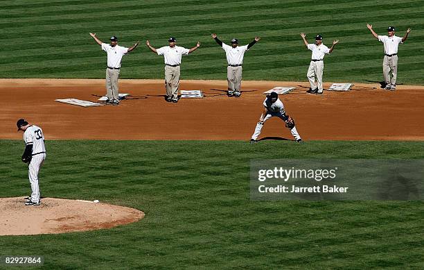 The New York Yankees grounds crew dances to the YMCA during the game against the Baltimore Orioles at Yankee Stadium on September 20, 2008 in the...