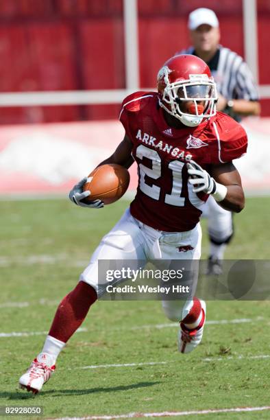 Michael Smith of the Arkansas Razorbacks runs with the ball against the Alabama Crimson Tide at Donald W. Reynolds Stadium on September 20, 2008 in...