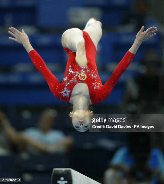 China's Ye Fan competes on the beam in the Artistic Gymnastics Women's Qualifiers at the Olympic Indoor Hall in Athens, Greece.