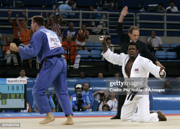 British judo star Winston Gordon from Tooting, south London reacts after being beaten by Holland's Mark Huizinga to deny him a bronze medal in the...