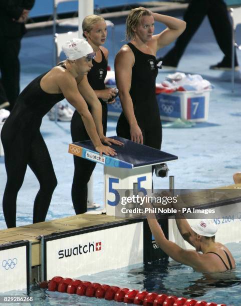 Great Britain's Women's 4 x 200m Freestyle relay team Georgina Lee, Caitlin McClatchey, Melanie Marshall and Karen Pickering react after finishing...