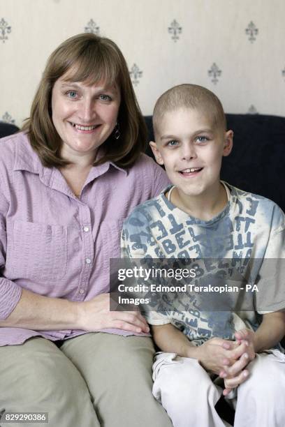 Joshua Hartley sits at his home in Romsey, Hampshire, with his mum Allison as he begins, his recovery from a life-saving bone marrow transplant from...