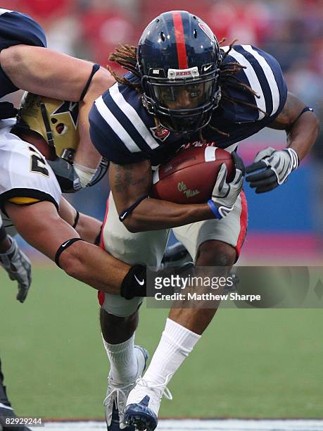 Dexter McCluster of the Ole Miss Rebels runs against the Vanderbilt Commodores during their game at Vaught-Hemingway Stadium on September 20, 2008 in...