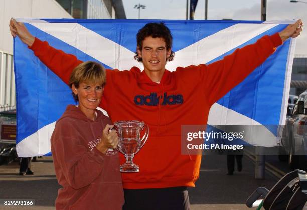 British tennis sensation Andrew Murray celebrates his victory in the boys' US Open with his mum Judy on his arrival back in Scotland. The 17-year-old...