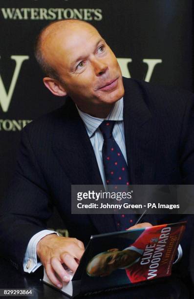 Former England Rugby Union coach Clive Woodward signs copies of his autobiography entitled 'Winning!', at Waterstones, in London. Woodward, who...