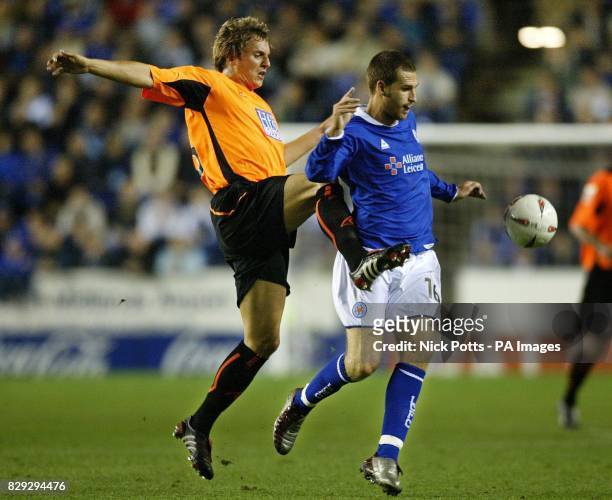 Leicester City's Gareth Williams tussles for the ball with Sheffield United defender Phil Jagielka, during the Coca Cola Championship match at the...