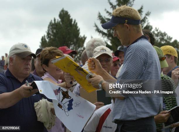 European Ryder Cup player Padraig Harrington signs autographs, during a practice round for the 35th Ryder Cup matches against the USA at Oakland...