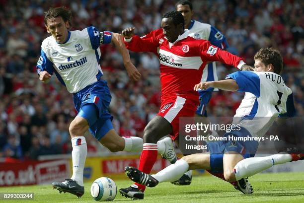 Middlesbrough's Jimmy Floyd Hasselbaink battles with Crystal Palace's Mark Hudson during their Barclays Premiership match at the Riverside Stadium,...