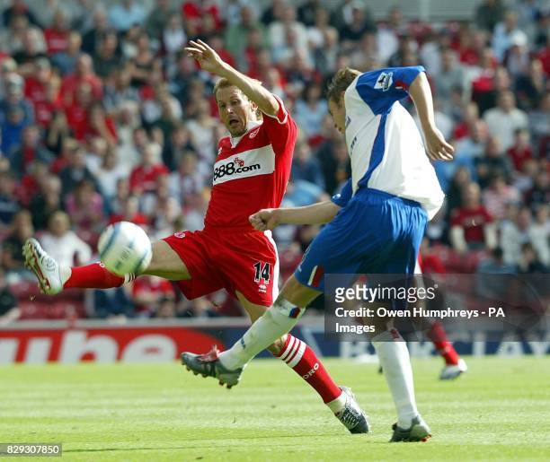 Gaizka Mendieta battles with Crystal Palace's Danny Granville during their Barclays Premiership match at the Riverside Stadium, Middlesbrough,...