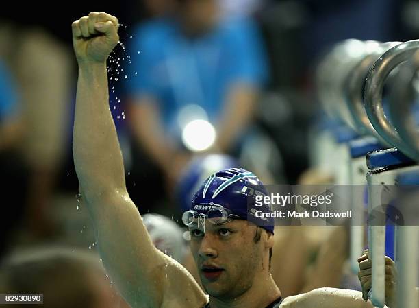 Matt Jaukovic of the NSWIS celebrates winning the Mens 100 SC Metre Butterfly event during day two of the Australian Short Course Championships at...
