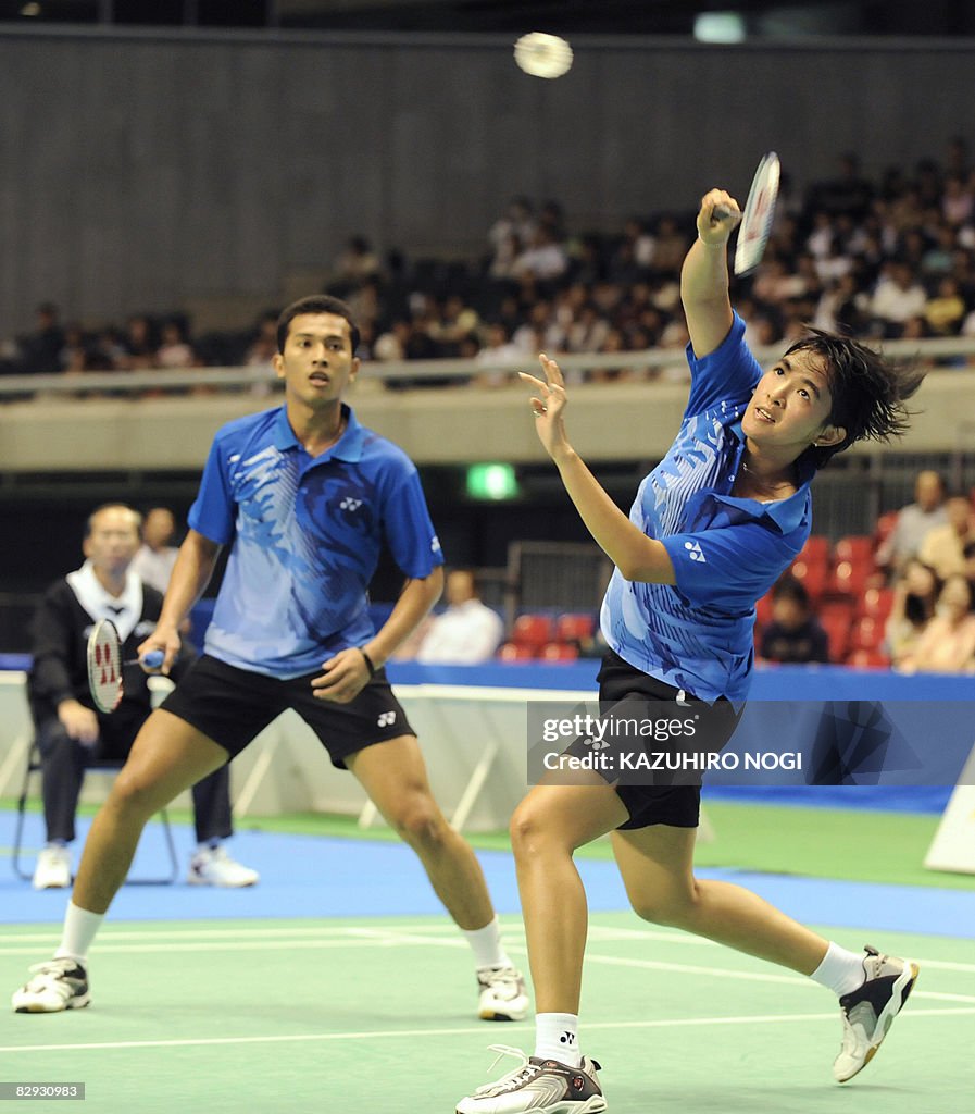 Indonesia's Muhammad Rijal and Vita Marissa play a point during their ...
