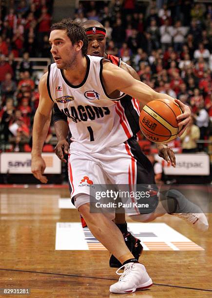 Adam Gibson of the Dragons drives to the basket during the NBL round one match between the Perth Wildcats and the South Dragons at Challenge Stadium...