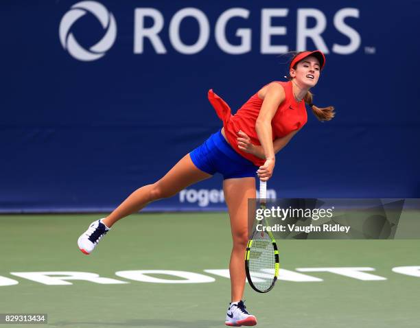 Catherine Bellis of the United States plays a shot against Caroline Garcia of France during Day 6 of the Rogers Cup at Aviva Centre on August 10,...