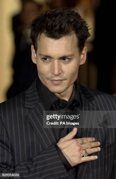 Star of the film Johnny Depp arrives for the premiere of 'Finding Neverland' which also stars Kate Winslet at Mostra Internazionale d'Arte...