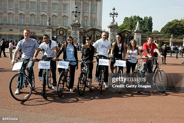 Ed Clancy, Shanaze Reade, Victoria Pendleton, Roxanne McKee, Jamie Staff, Jenny Pacey, Georgie Thompson and Austin Healey pose infront of Buckingham...