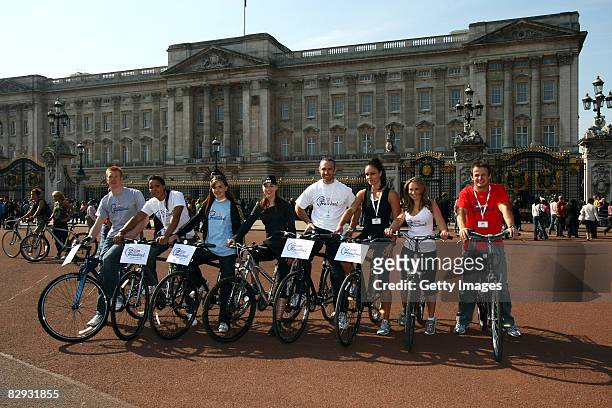 Ed Clancy, Shanaze Reade, Victoria Pendleton, Roxanne McKee, Jamie Staff, Jenny Pacey, Georgie Thompson and Austin Healey pose infront of Buckingham...