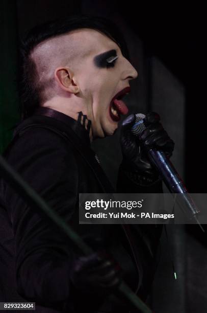 American rock singer Marilyn Manson on stage during the 'MTV Icon of 2004' tribute to 1980s goth rock band The Cure - the event honouring their...