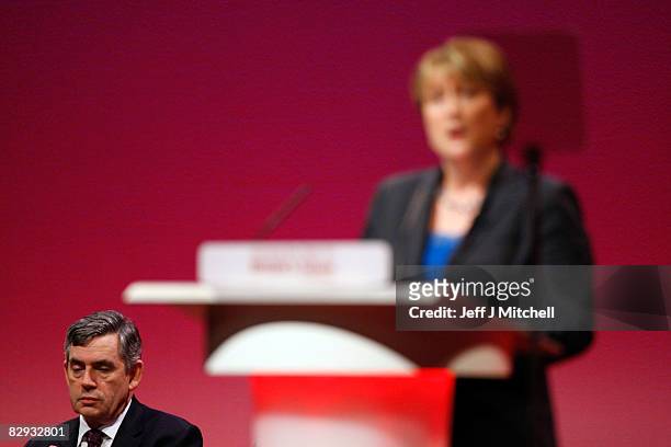 Prime Minister Gordon Brown listens while Home Secretary Jacqui Smith speaks during the Labour Conference on September 21, 2008 in Manchester,...