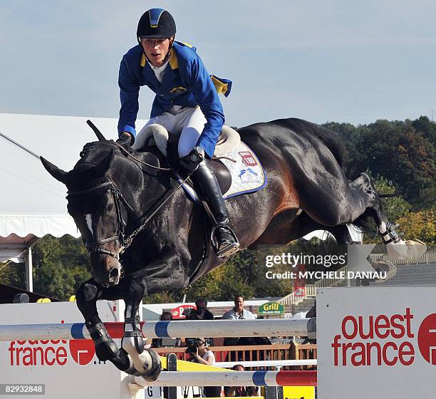 German rider Daniel Deussel competes, on September 21 during the final of the Top Ride, a jumping event gathering the best ten riders who competed...