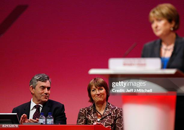 Prime Minister Gordon Brown and Deputy Leader Harriet Harman listen during a speech by Home Secretary Jacqui Smith during the Labour Conference on...