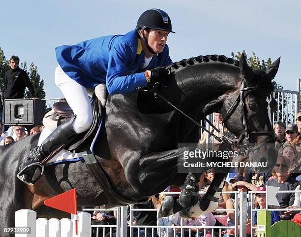 German rider Daniel Deussel competes, on September 21 during the final of the Top Ride, a jumping event gathering the best ten riders who competed...