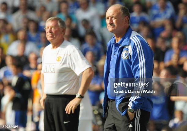 Chelsea manager Luiz Felipe Scolari looks on with Manchester United manager Sir Alex Ferguson during the Barclays Premier League match between...