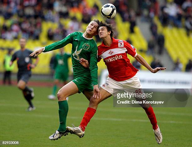 Egor Filipenko of FC Spartak Moscow battles for the ball with Aleksandr Bukharov of FC Rubin Kazan during the Russian Football League Championship...