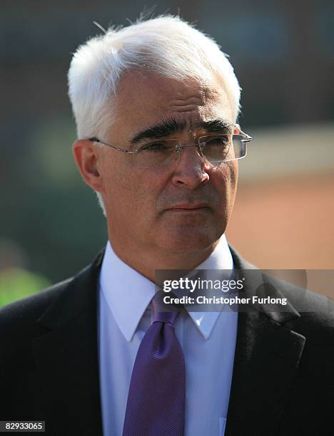 Chancellor Alistair Darling takes a break outside in the sunshine during the Labour Conference on September 21, 2008 in Manchester, England. On day...