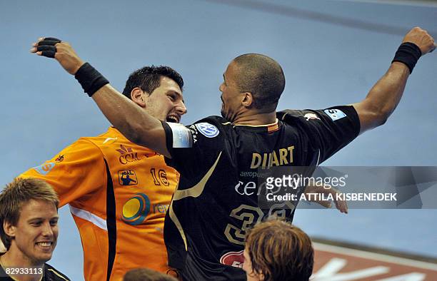 Ciudad Real's French Didier Dinart celebrates with his goalkeeper Arpad Sterbik their victory on Hungarian MKB Veszprem's during their EHF 2008 Men's...