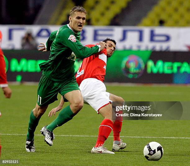 Martin Stranzl of FC Spartak Moscow battles for the ball with Aleksandr Bukharov of FC Rubin Kazan during the Russian Football League Championship...