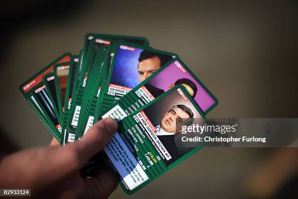 Delegate shows off a pack of Political Top Trumps cards which are being given away in the exhibition hall during the Labour Conference on September...