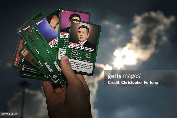 Delegate shows off a pack of Political Top Trumps cards which are being given away in the exhibition hall during the Labour Conference on September...