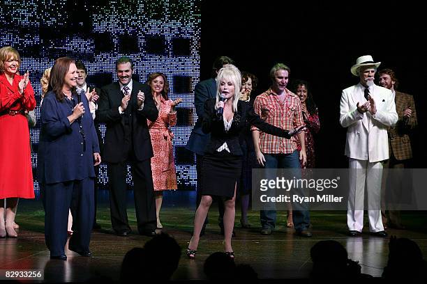 Book writer Patricia Resnick and Dolly Parton talk during the curtian call for the world premiere of of "9 to 5: The Musical" at Center Theatre...