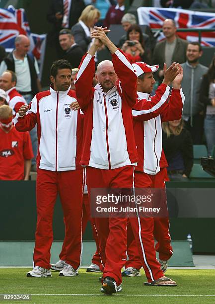 Gilbert Schaller, Captain of Austria celebrates his teams victory over Great Britain during day three of the Davis Cup World Group Playoff tie...