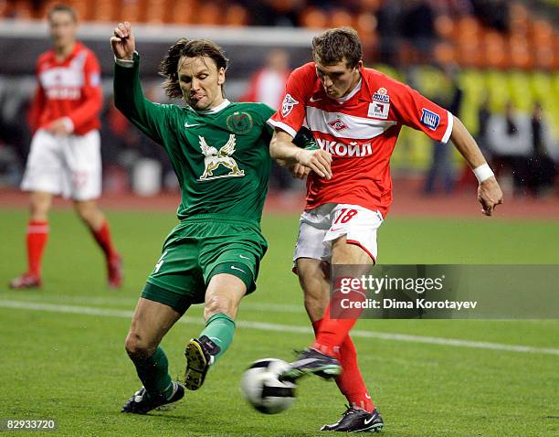 Aleksandr Prudnikov of FC Spartak Moscow battles for the ball with Aleksei Popov of FC Rubin Kazan during the Russian Football League Championship...