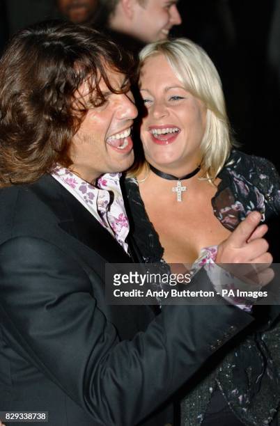 Interior designer Lawrence Llewelyn-Bowen and his wife Jackie arrive for the UK charity premiere of Sky Captain And The World Of Tomorrow at the UCI...