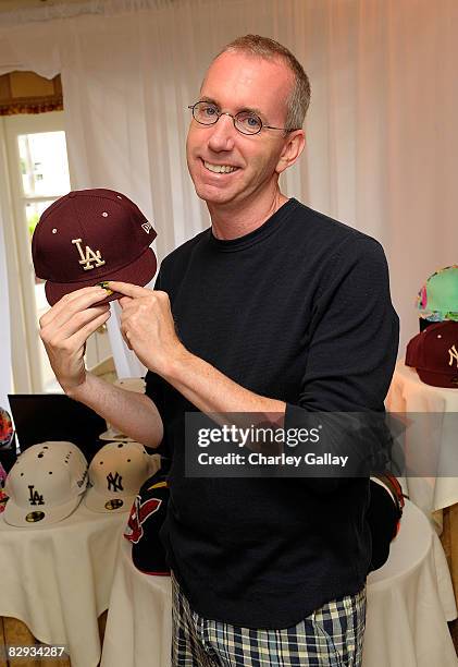 Producer Blake McCormick poses with the New Era Cap display during the HBO Luxury Lounge in honor of the 60th annual Primetime Emmy Awards featuring...