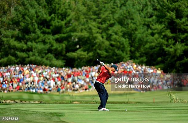 Anthony Kim of the USA team hits his second shot on the seventh hole during the singles matches on the final day of the 2008 Ryder Cup at Valhalla...