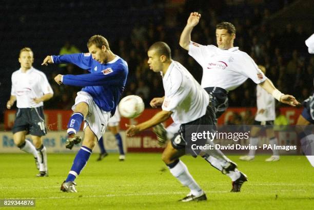 Leicester City's Gareth Williams has his shot blocked by Preston North End's Brian O'Neill and Marlon Broomes during the Carling Cup second round...