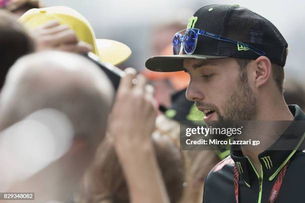 Jonas Folger of Germany and Monster Yamaha Tech 3 speaks with fans during the MotoGp of Austria - Preview at Red Bull Ring on August 10, 2017 in...