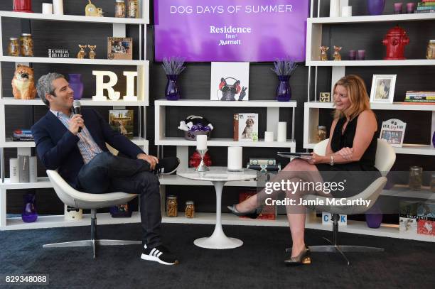 Andy Cohen speaks onstage with Jackie McAllister, VP of Brand Marketing at Marriott International for Residence Inn at the Residence Inn by Marriott...