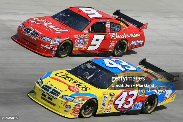 Bobby Labonte driver of the Cheerios Racing/Betty Crocker Dodge races with Kasey Kahne driver of the Budweiser Dodge during the NASCAR Sprint Cup...