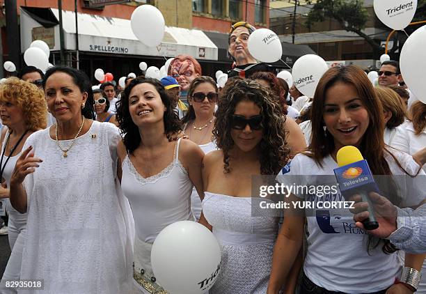 Mexican actresses Lilia Aragon, Maria Rebeca, Vica Andrade and Claudia Lizaldi dressed with white clothes take part in a rally called by Human Face...