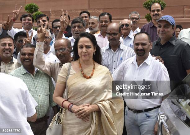 Leader Hema Malini poses for a picture with the delegation during the Monsoon Session at the Parliament on August 10, 2017 in New Delhi, India.