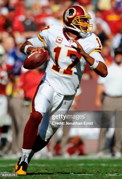 Jason Campbell of the Washington Redskins looks to throw the ball against the Arizona Cardinals in the fourth quarter at FedEx Field September 21,...
